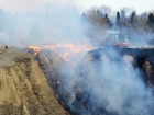 Friday, April 26, 2013NEWS PHOTO EMMA BENNETTFirefighters tackle a grass fire on the hillside between Kipling Street S.E. and College Drive S.E. Friday evening. Wind gusts swept the fire towards houses in Upland Drive. Friday, April 26, 2013NEWS PHOTO EMMA BENNETTFirefighters tackle a grass fire on the hillside between Kipling Street S.E. and College Drive S.E. Friday evening. Wind gusts swept the fire towards houses in Upland Drive.